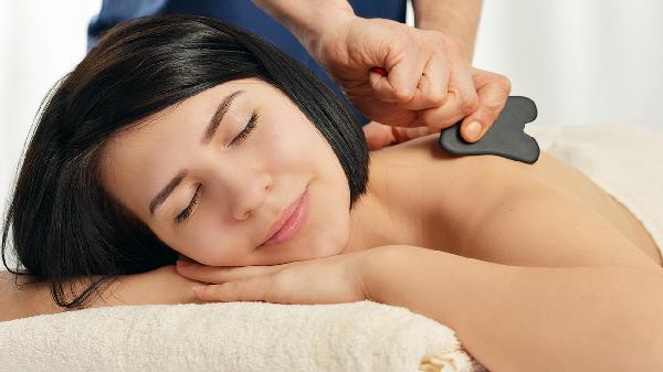 刮痧皮肤是黑紫色的是什么原因